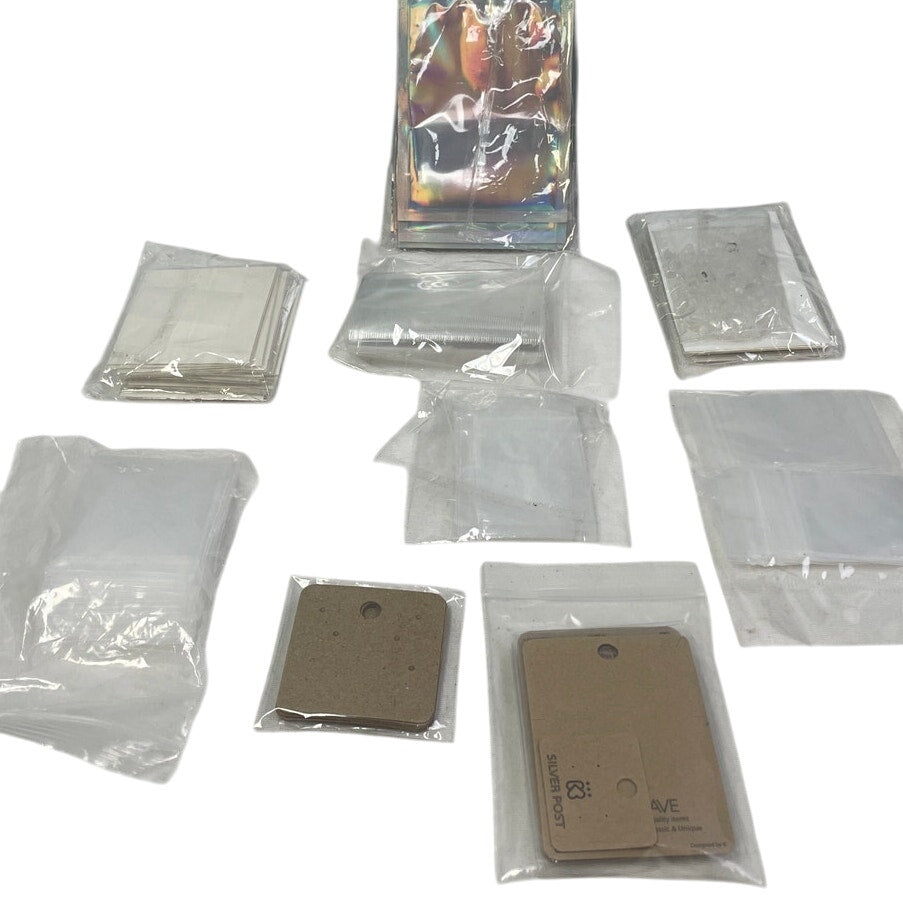Lot of 100+ Blank New Plastic Cardboard Jewelry Earrings Cards Bags Packaging