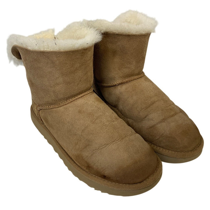 Ugg Womens Size 7 Tan Ankle Boots Mini Back Bow Fur Lined Round Toe Shoes