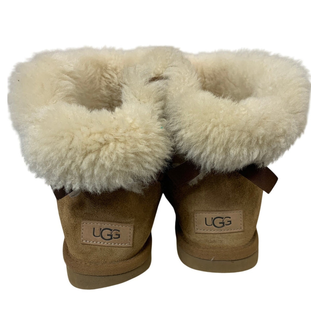 Ugg Womens Size 7 Tan Ankle Boots Mini Back Bow Fur Lined Round Toe Shoes