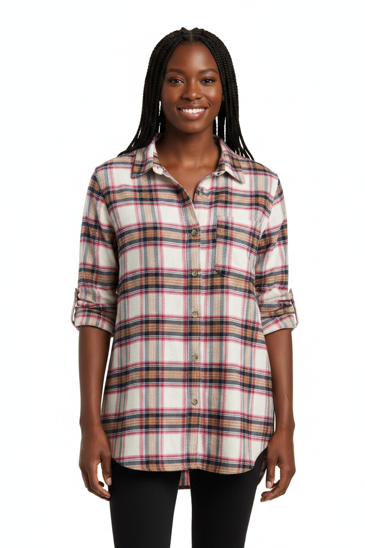 Black woman standing with buttoned flannel shirt on white background