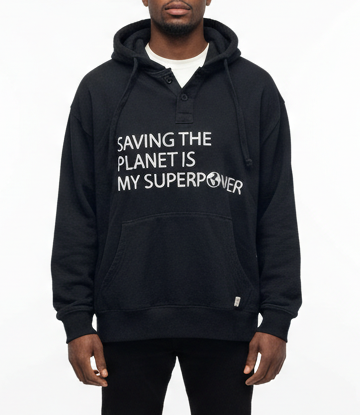 Man wearing the “Saving the Planet Is My Superpower” hoodie on a white background