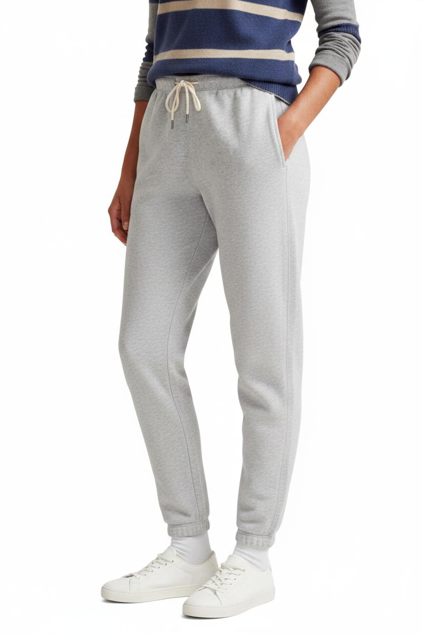 Woman in Gray Joggers White Background