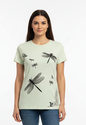 Woman wearing the pale green dragonfly tee on a white background