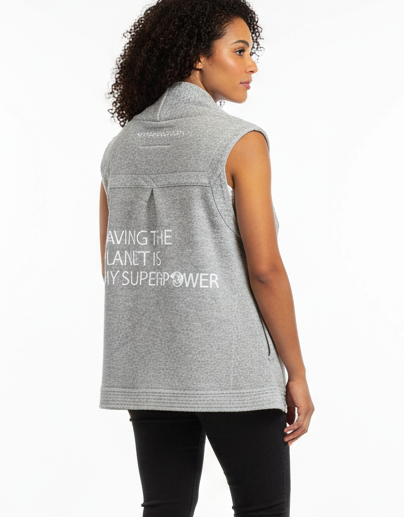 Woman wearing the vest with the artwork correctly shown on the back