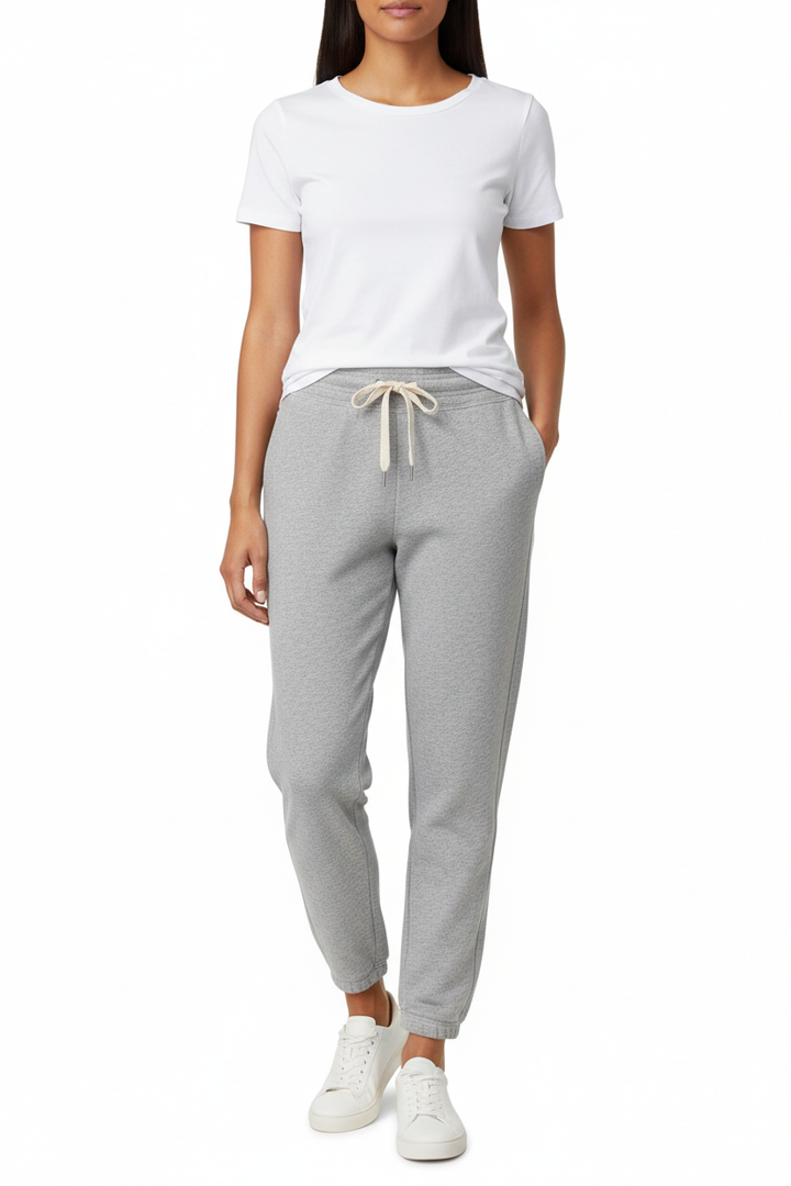 Woman wearing very light heather gray jogger sweatpants